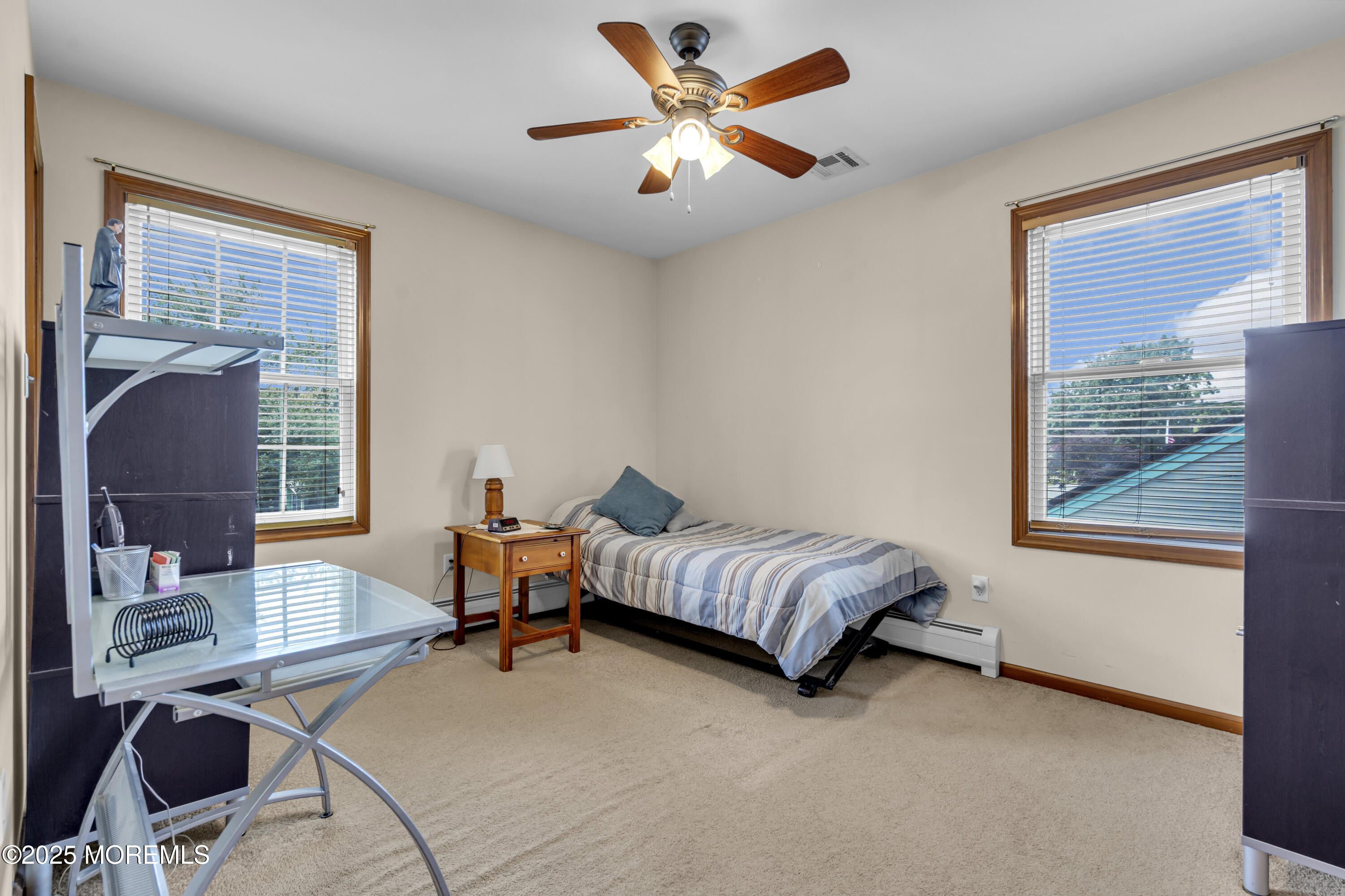 2221 Wilson Road Point Pleasant, NJ 08742 - Photo 38 of 63 a living room with furniture and a window