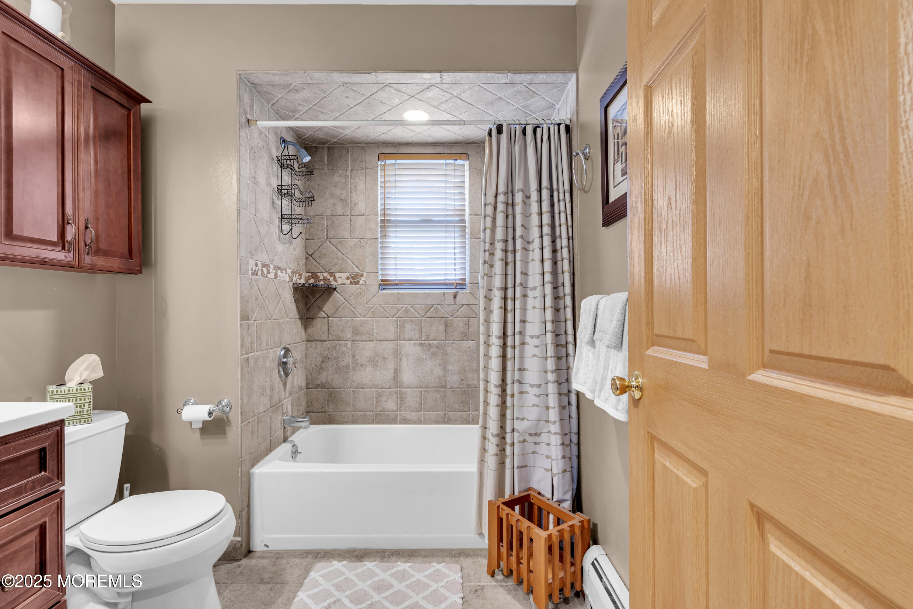 2221 Wilson Road Point Pleasant, NJ 08742 - Photo 40 of 63 a bathroom with a bathtub toilet and sink