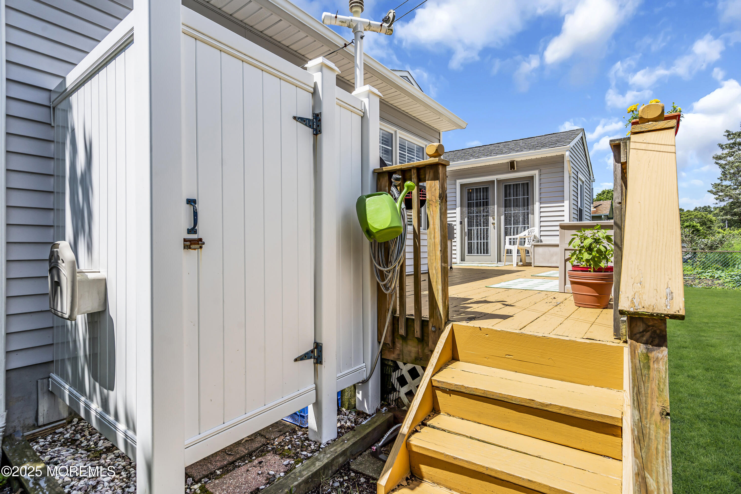 2221 Wilson Road Point Pleasant, NJ 08742 - Photo 50 of 63 a view of a house with wooden floor and a potted plant