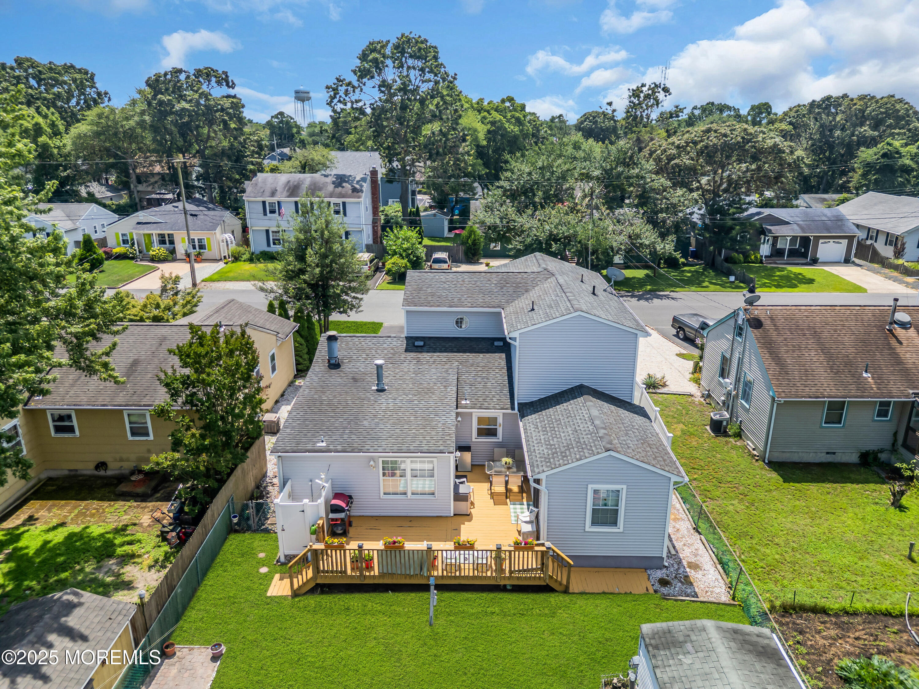 2221 Wilson Road Point Pleasant, NJ 08742 - Photo 55 of 63 an aerial view of a house with a garden and swimming pool