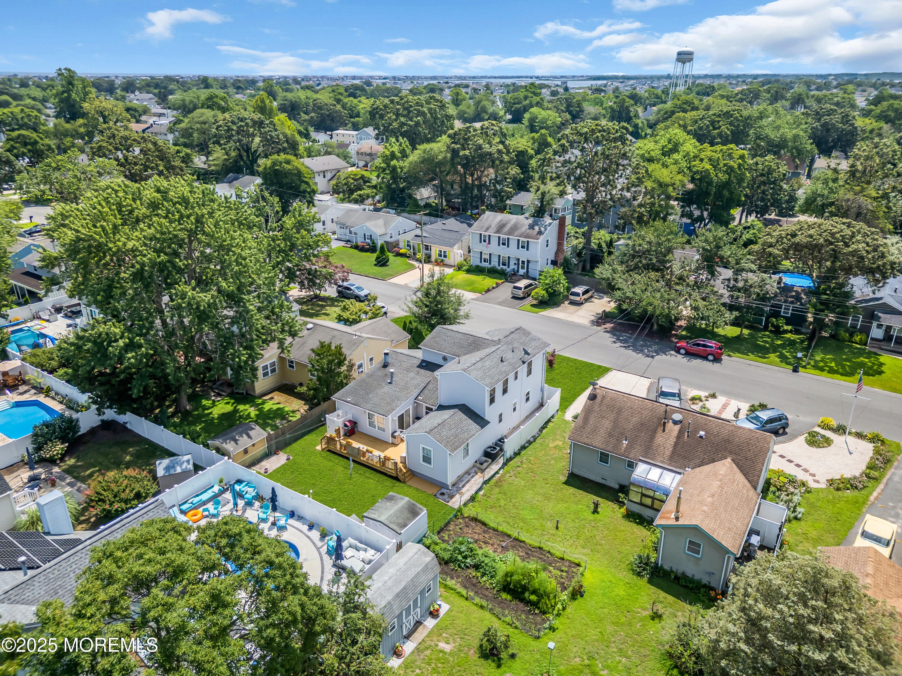 2221 Wilson Road Point Pleasant, NJ 08742 - Photo 57 of 63 an aerial view of a house with a garden
