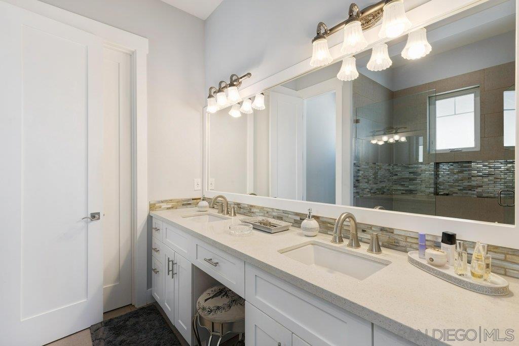 416 A Avenue Coronado, CA 92118 - Photo 15 of 25 Master Bath Featuring Double Sink Vanity, Tiled Shower, Water Closet, Walk-in Closet