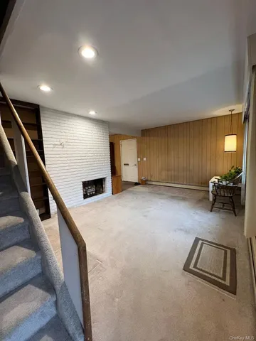 a room with gym equipment and a window