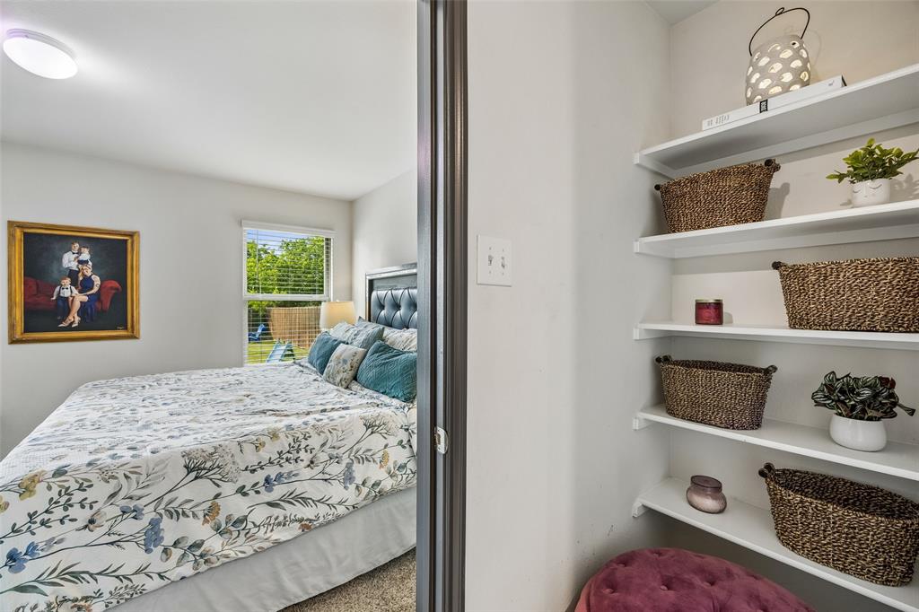 802 Rustic Way Royse City, TX 75189 - Photo 27 of 38 a bedroom with a bed and a window