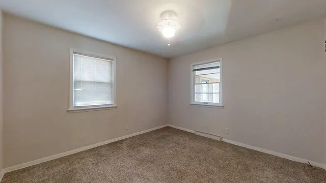 an empty room with a window