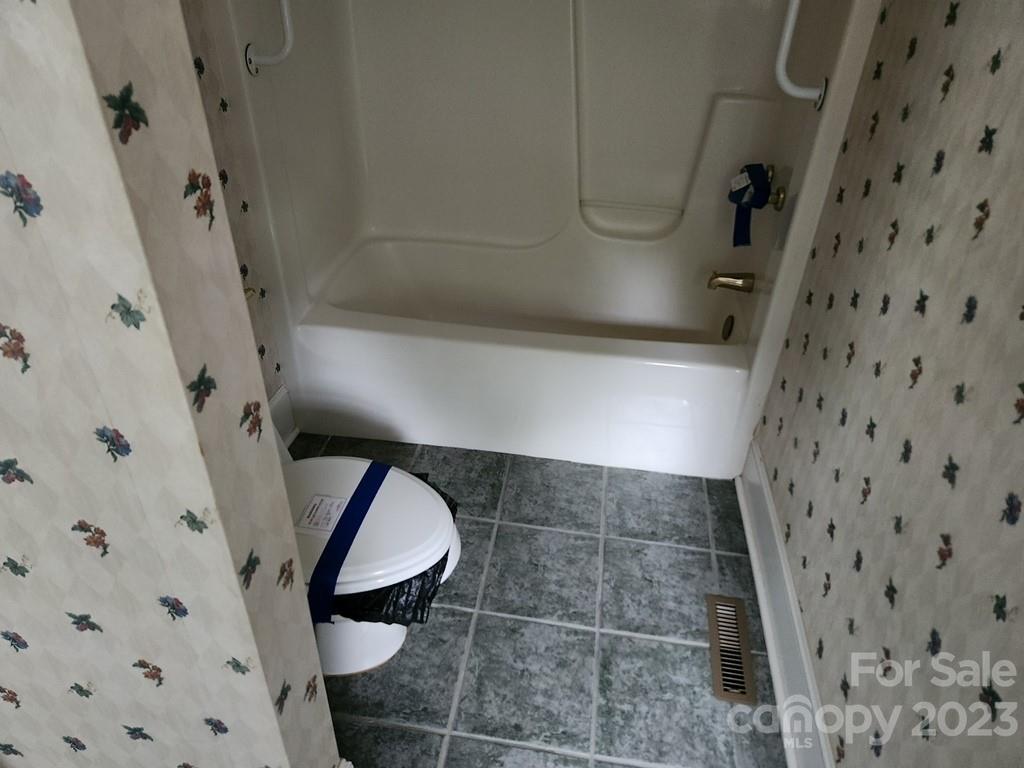 360 Hooper Creek Road Tryon, NC 28782 - Photo 32 of 38 a bathroom with a shower