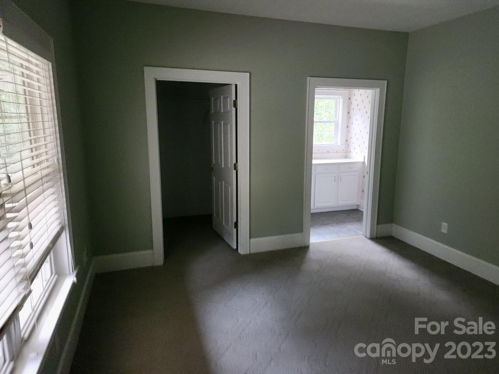 360 Hooper Creek Road Tryon, NC 28782 - Photo 34 of 38 an empty room with windows