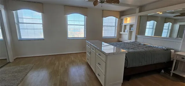 a view of a balcony with furniture