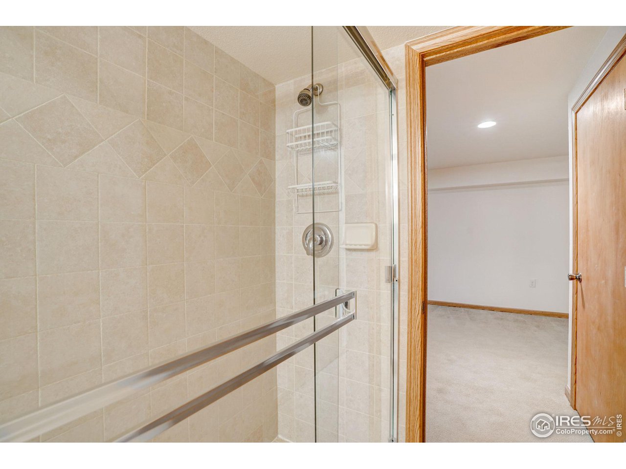 3317 Laredo Lane Fort Collins, CO 80526 - Photo 19 of 33 a bathroom with a shower