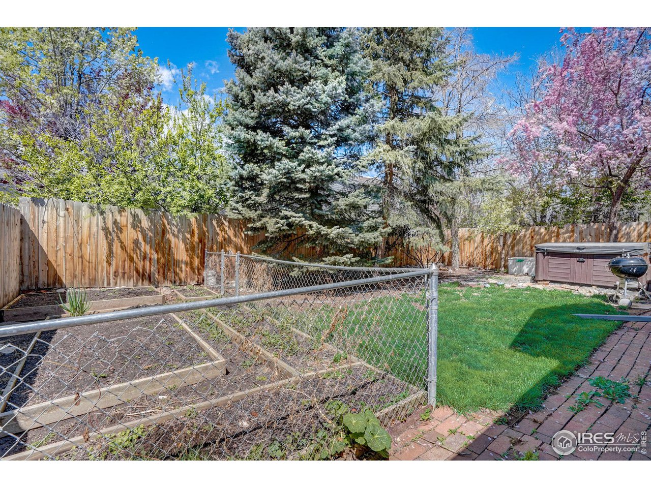 3317 Laredo Lane Fort Collins, CO 80526 - Photo 30 of 33 a view of a backyard