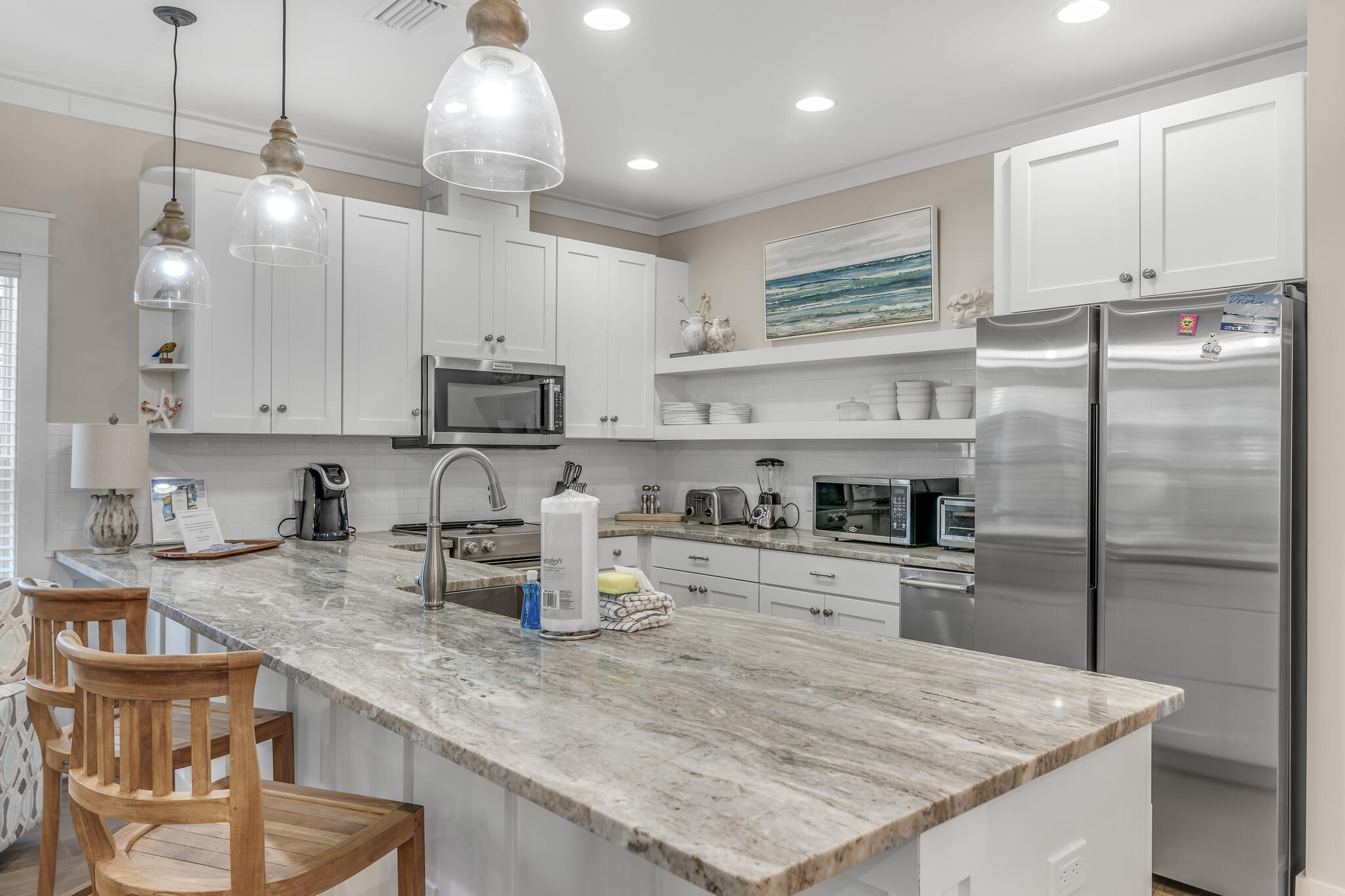 973 Patina Blvd Inlet Beach Inlet Beach, FL 32461 - Photo 11 of 30 a kitchen with kitchen island granite countertop a sink stove and refrigerator