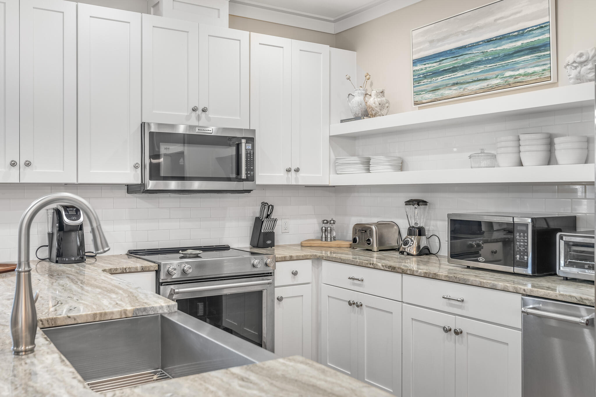 973 Patina Blvd Inlet Beach Inlet Beach, FL 32461 - Photo 12 of 30 a kitchen with stainless steel appliances granite countertop a stove a sink and a white cabinets