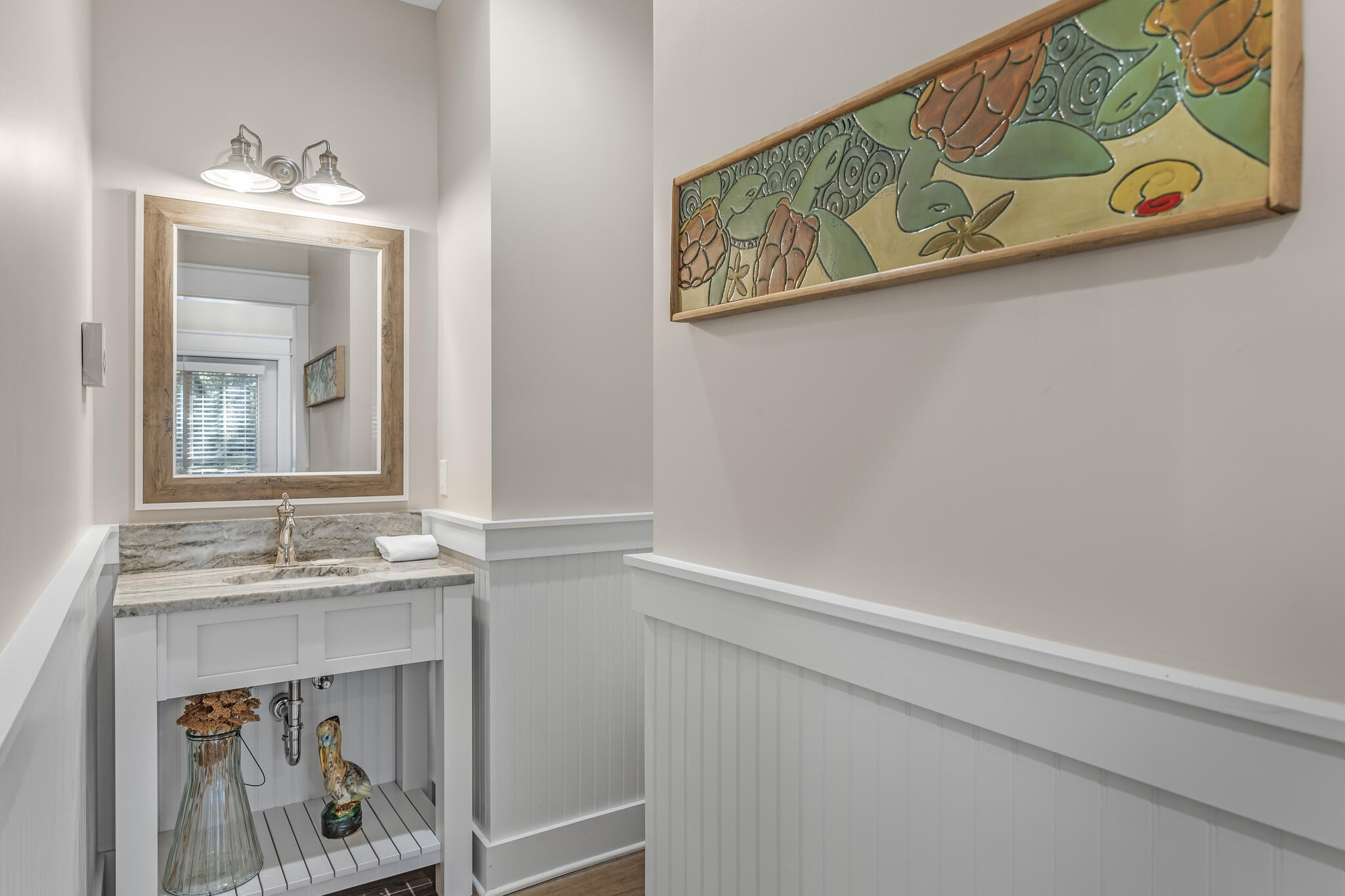 973 Patina Blvd Inlet Beach Inlet Beach, FL 32461 - Photo 16 of 30 a bathroom with a sink and a mirror