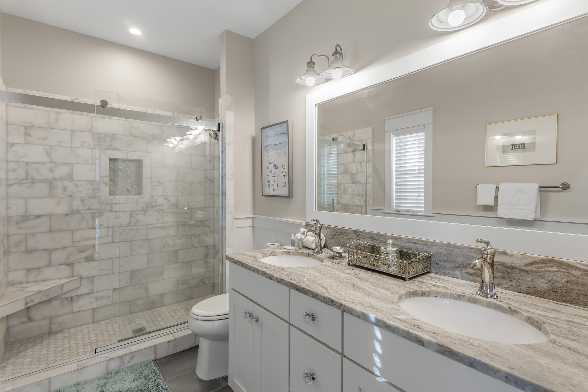 973 Patina Blvd Inlet Beach Inlet Beach, FL 32461 - Photo 19 of 30 a bathroom with a granite countertop double vanity sinks a mirror a toilet a vanity and shower