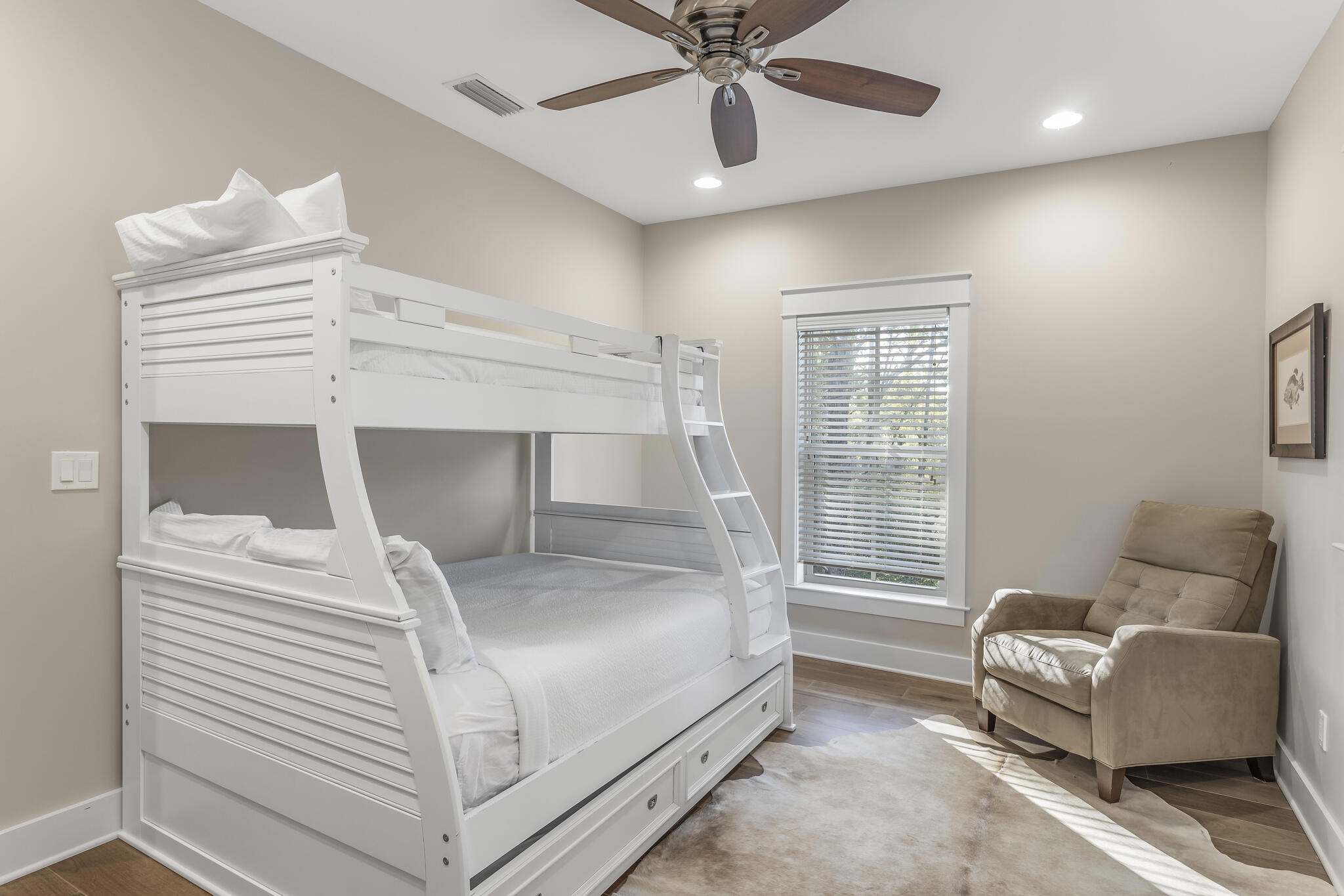973 Patina Blvd Inlet Beach Inlet Beach, FL 32461 - Photo 26 of 30 a bedroom with a bed and a chandelier