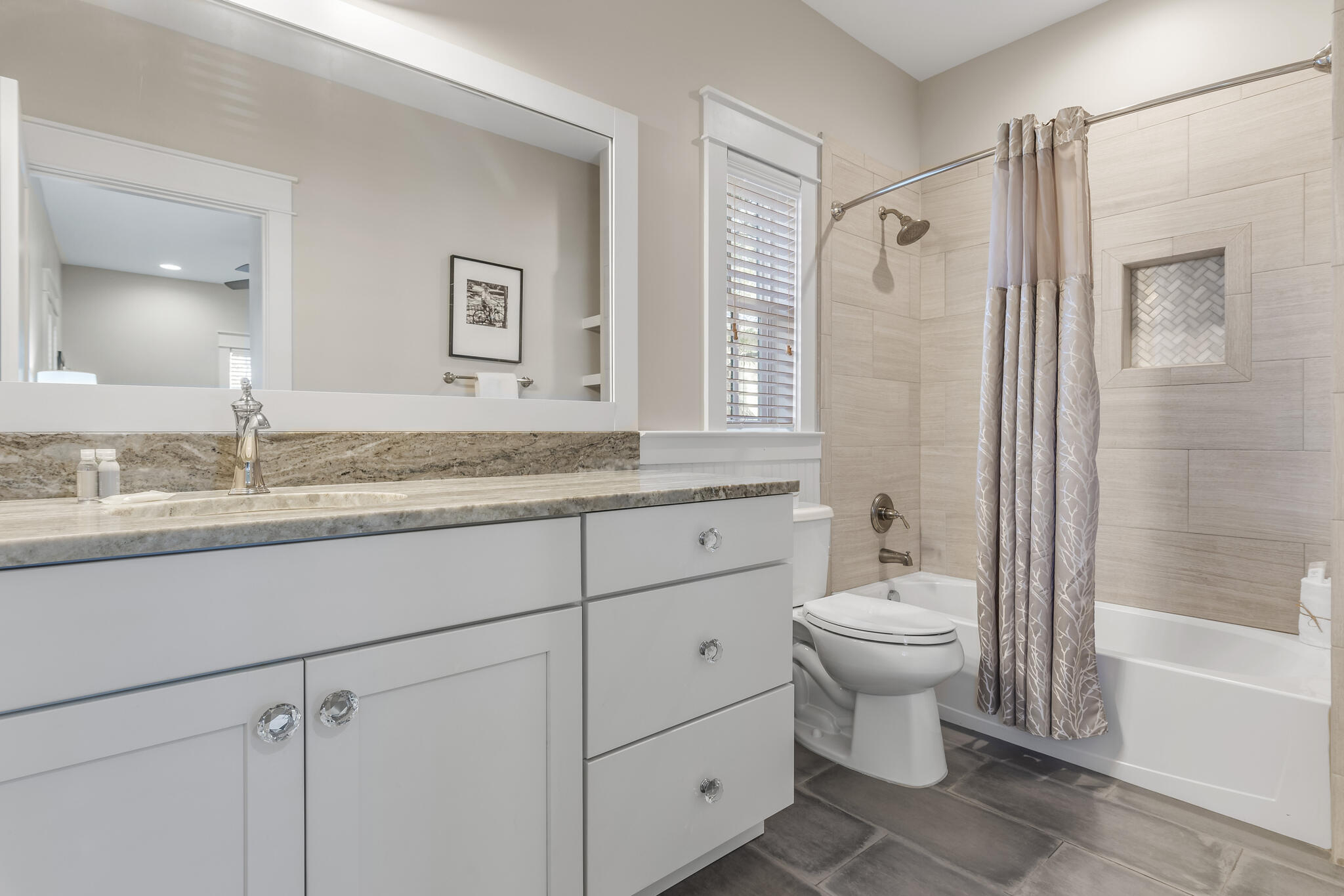 973 Patina Blvd Inlet Beach Inlet Beach, FL 32461 - Photo 28 of 30 a bathroom with a granite countertop sink toilet mirror vanity and shower