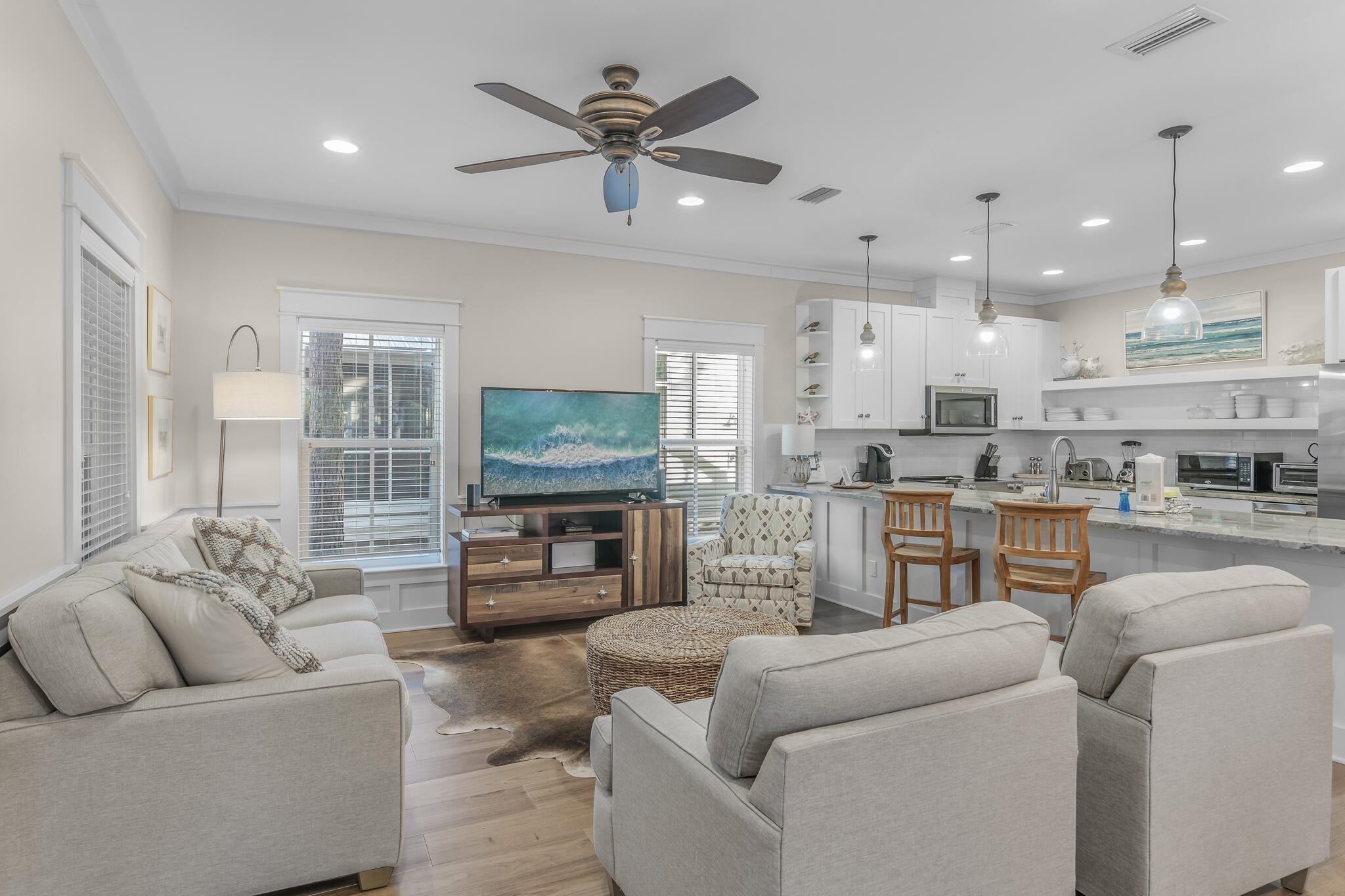 973 Patina Blvd Inlet Beach Inlet Beach, FL 32461 - Photo 5 of 30 a living room with furniture kitchen view and a flat screen tv
