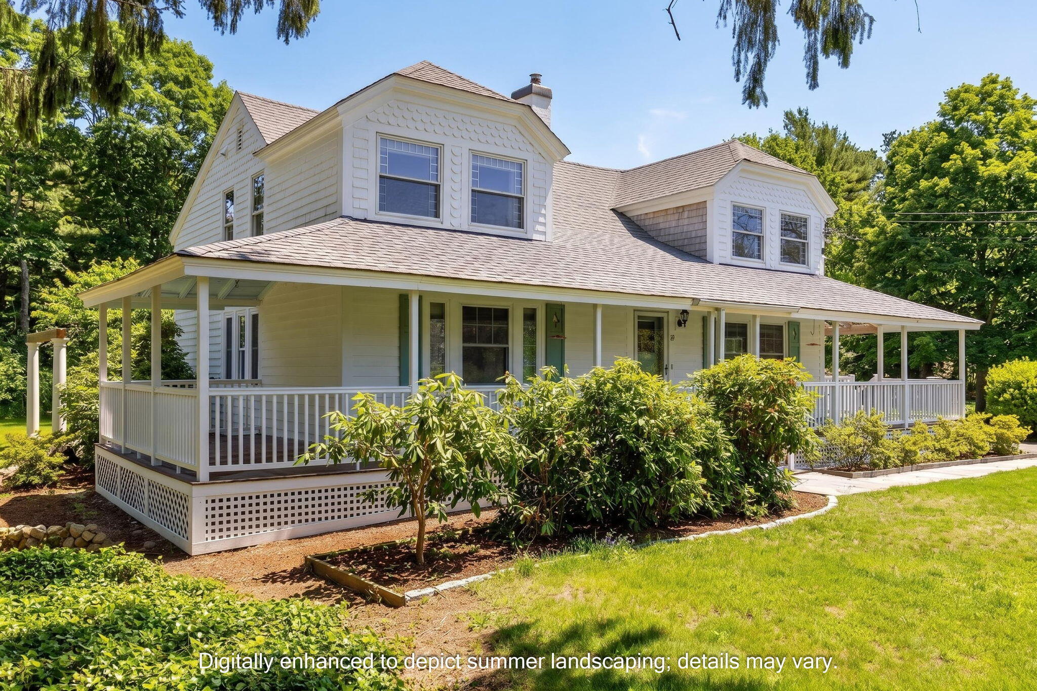 69 County Road Bourne, MA 02532 - Photo 40 of 54 a front view of a house with a garden