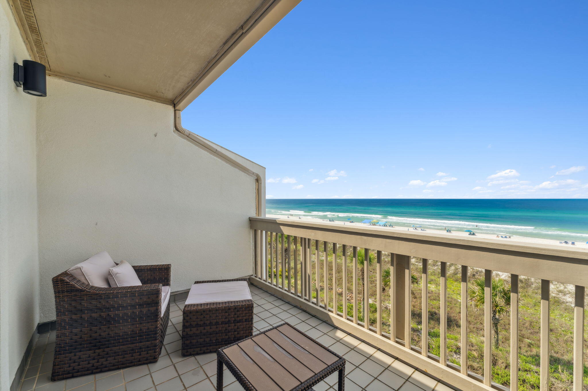 23011 Front Beach Road, Unit E47 Panama City Beach, FL 32413 - Photo 21 of 29 a view of balcony with wooden floor