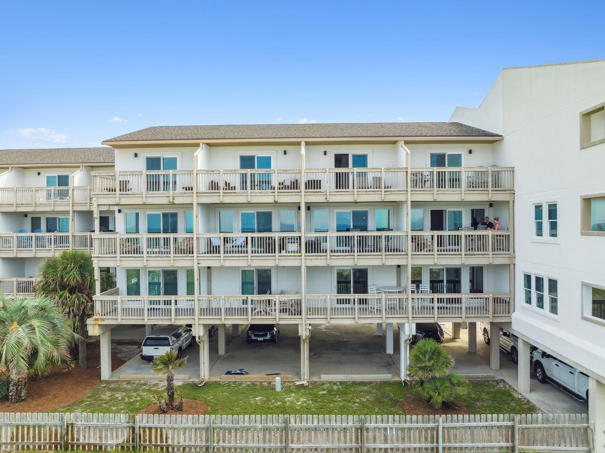23011 Front Beach Road, Unit E47 Panama City Beach, FL 32413 - Photo 27 of 29 a view of a building from a balcony
