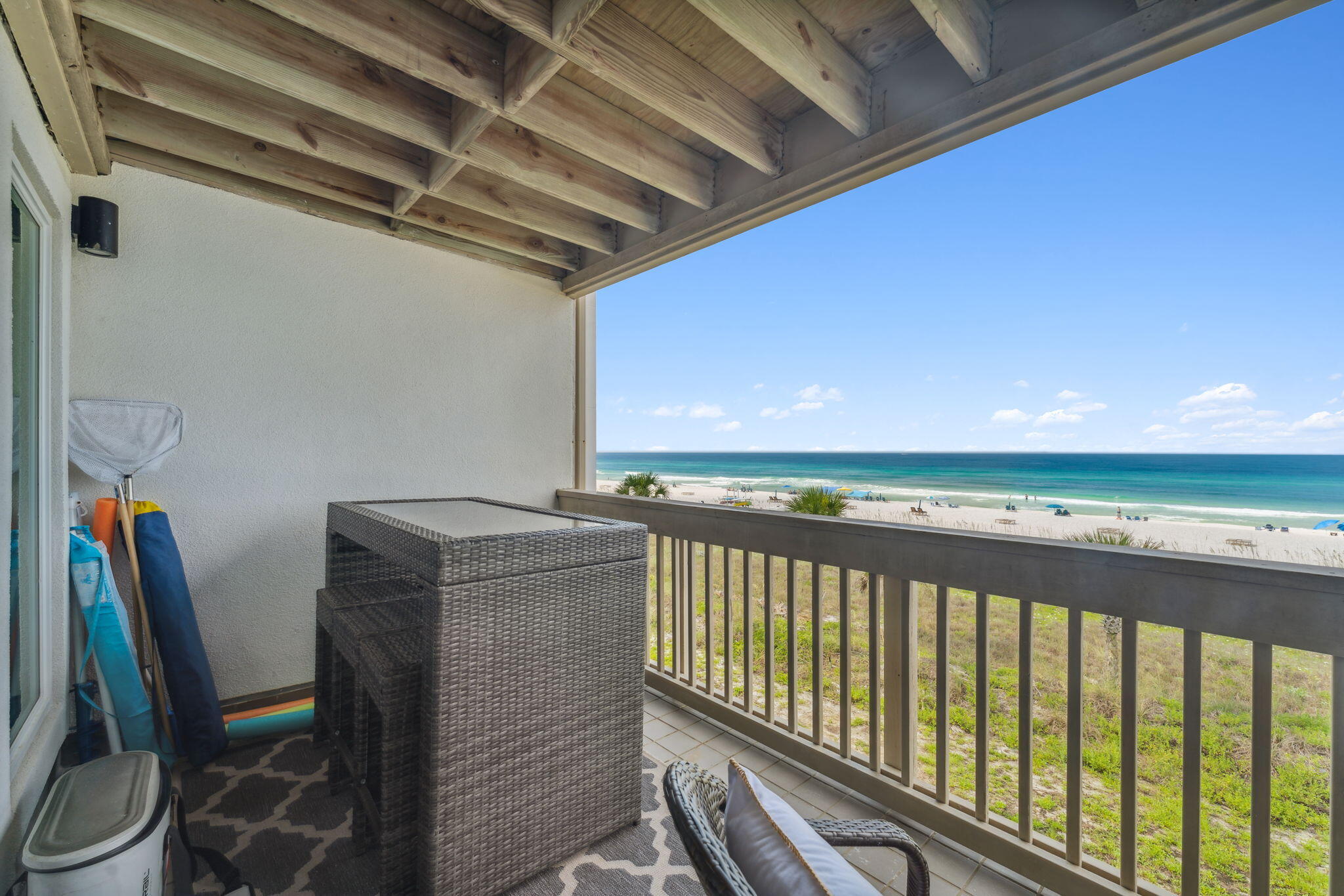 23011 Front Beach Road, Unit E47 Panama City Beach, FL 32413 - Photo 10 of 29 a view of a balcony with furniture