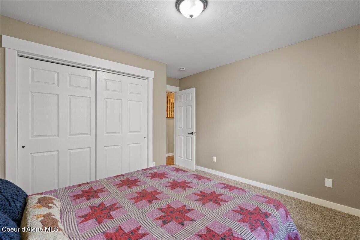 16289 West Summerfield Road Post Falls, ID 83854 - Photo 15 of 66 main floor bedroom