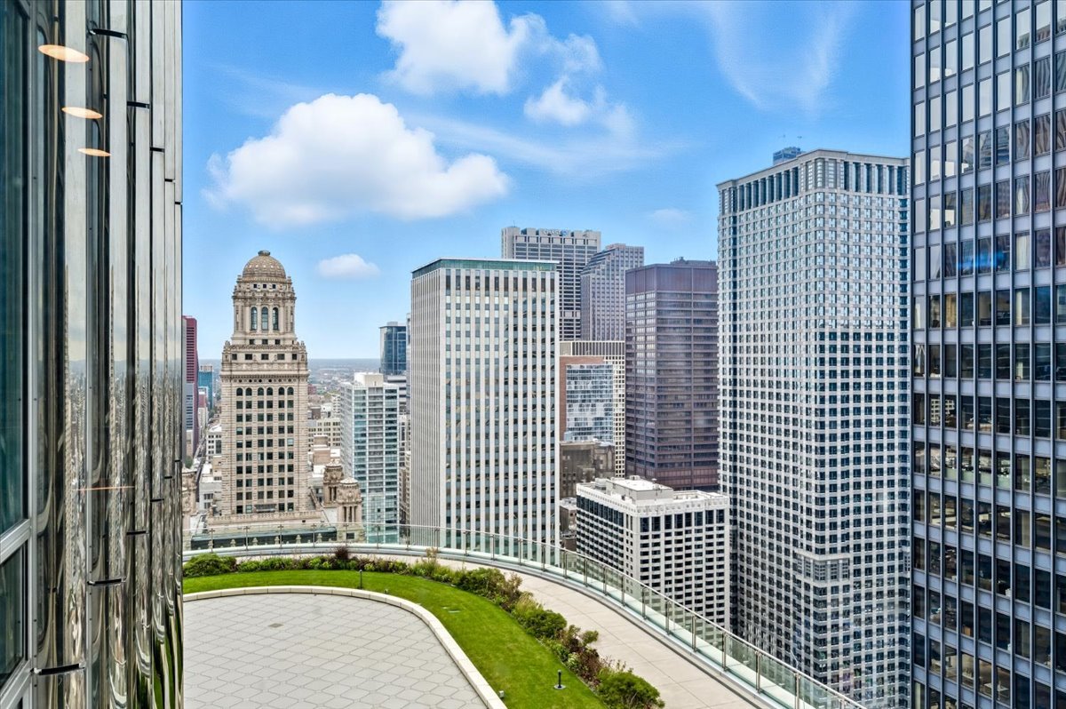 401 North Wabash Avenue, Unit 31G Chicago, IL 60611 - Photo 19 of 46 a view of a city with tall buildings