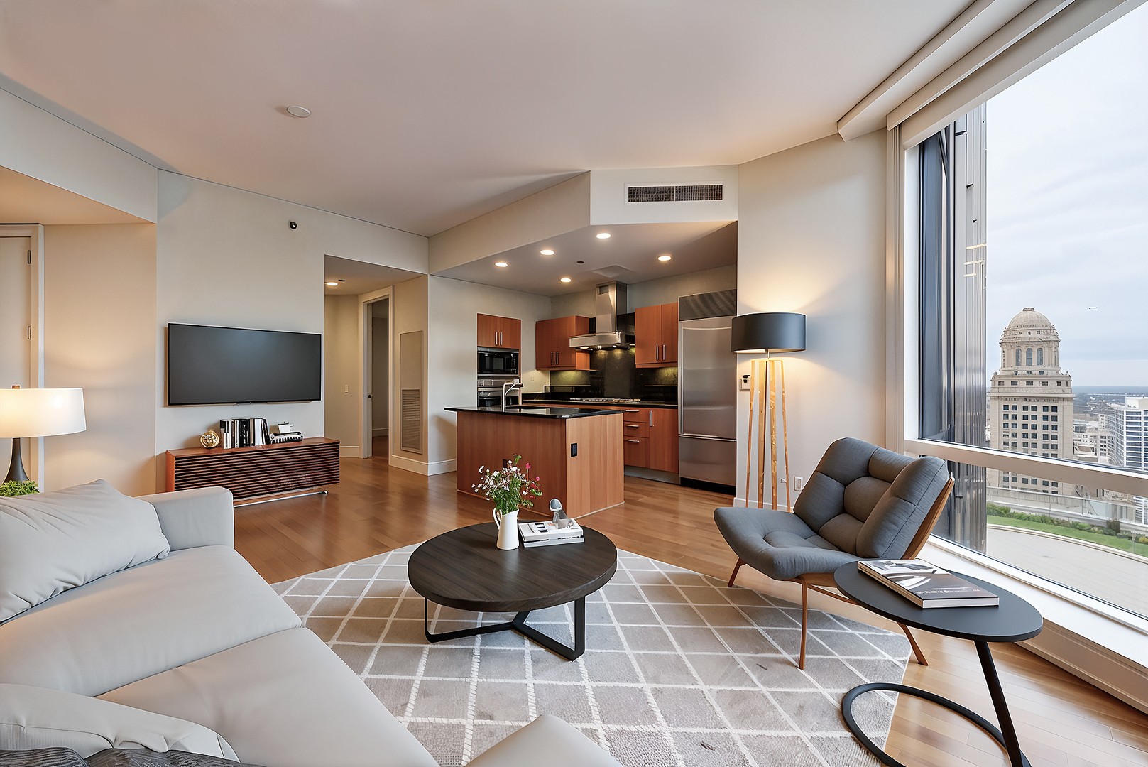 401 North Wabash Avenue, Unit 31G Chicago, IL 60611 - Photo 4 of 46 a living room with furniture and a flat screen tv