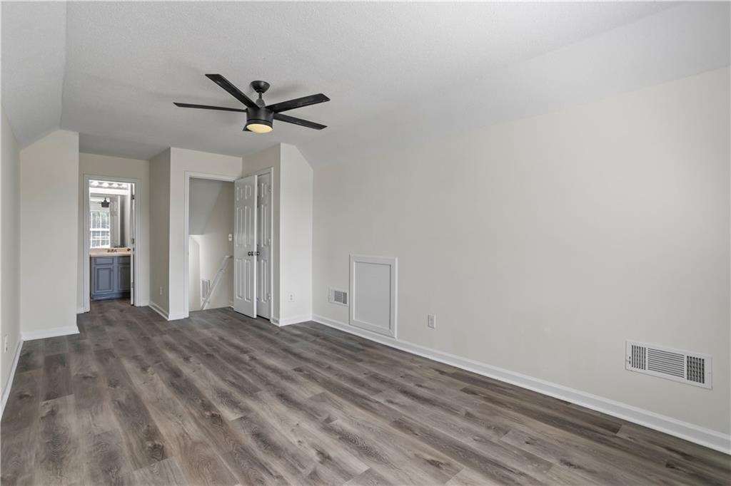 6639 Overlook Ridge Atlanta, GA 30349 - Photo 24 of 35 a view of a livingroom with a ceiling fan