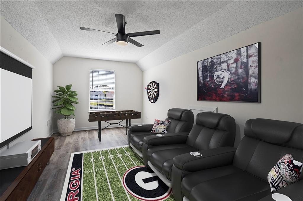 6639 Overlook Ridge Atlanta, GA 30349 - Photo 26 of 35 a living room with furniture and a rug