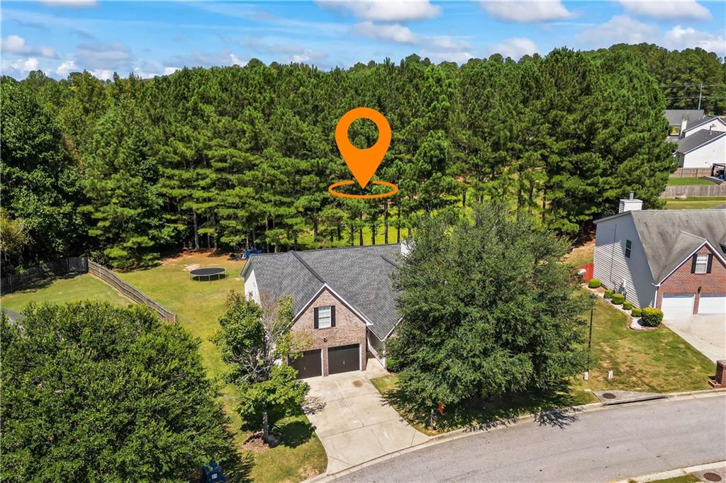 6639 Overlook Ridge Atlanta, GA 30349 - Photo 32 of 35 an aerial view of a house with a swimming pool a yard and a lots of potted plants