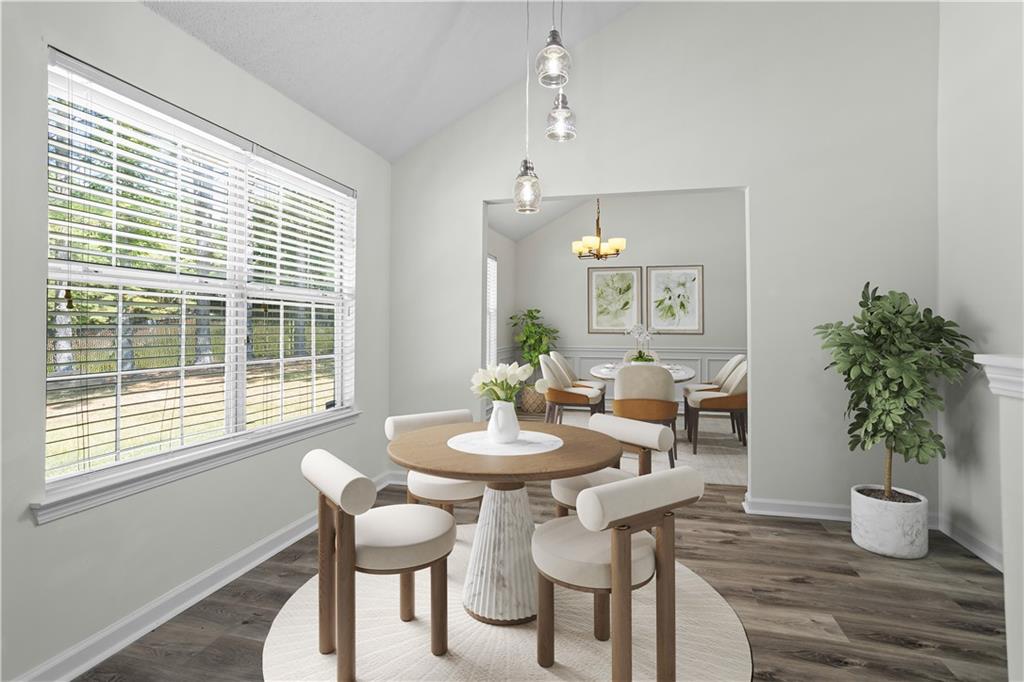 6639 Overlook Ridge Atlanta, GA 30349 - Photo 7 of 35 a view of a dining room with furniture window and wooden floor