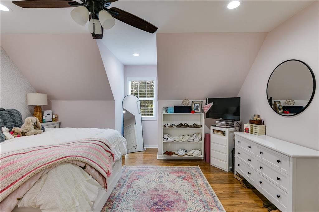 1800 Mandeville Road Bremen, GA 30110 - Photo 21 of 41 a bedroom with a bed and a flat tv screen on the dresser