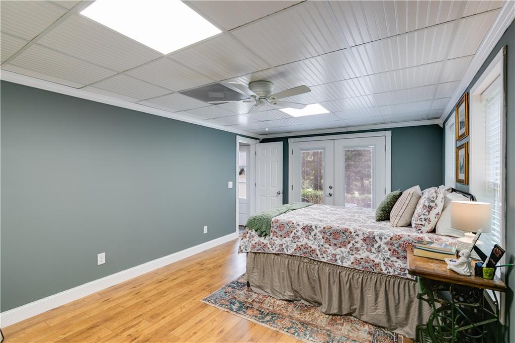 1800 Mandeville Road Bremen, GA 30110 - Photo 31 of 41 a bedroom with bed and wooden floor