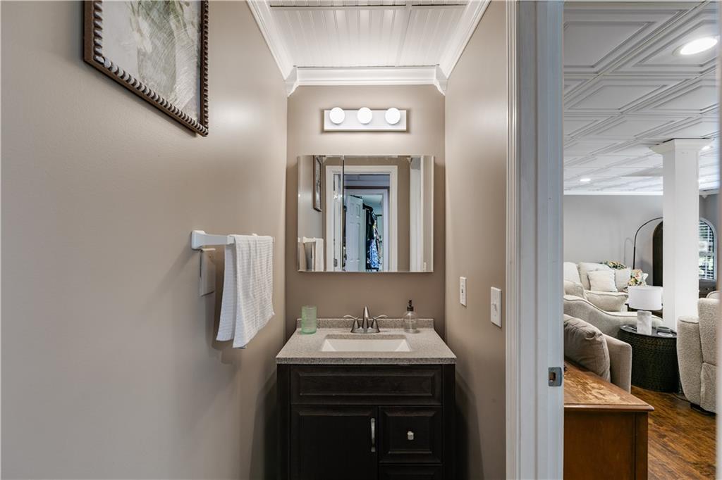 1800 Mandeville Road Bremen, GA 30110 - Photo 33 of 41 a bathroom with a sink and a mirror