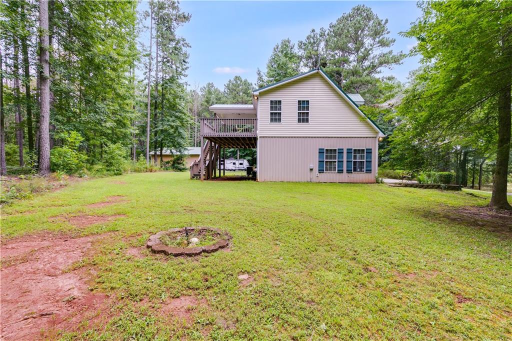 1800 Mandeville Road Bremen, GA 30110 - Photo 5 of 41 a view of a house with a yard and sitting area