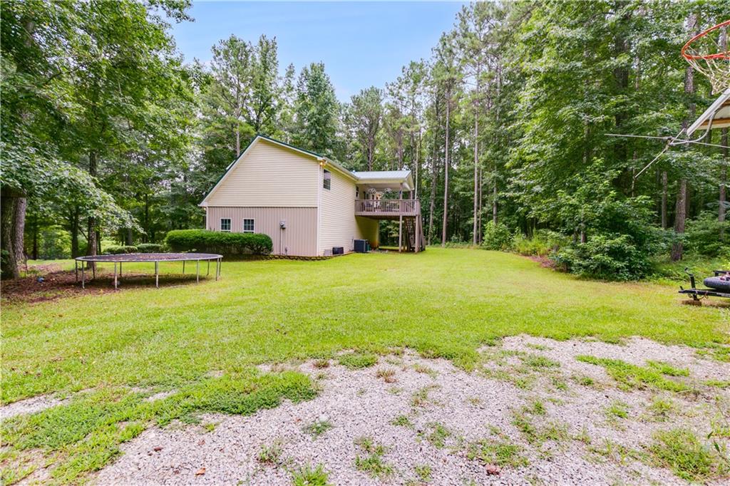 1800 Mandeville Road Bremen, GA 30110 - Photo 6 of 41 a front view of a house with yard and trees
