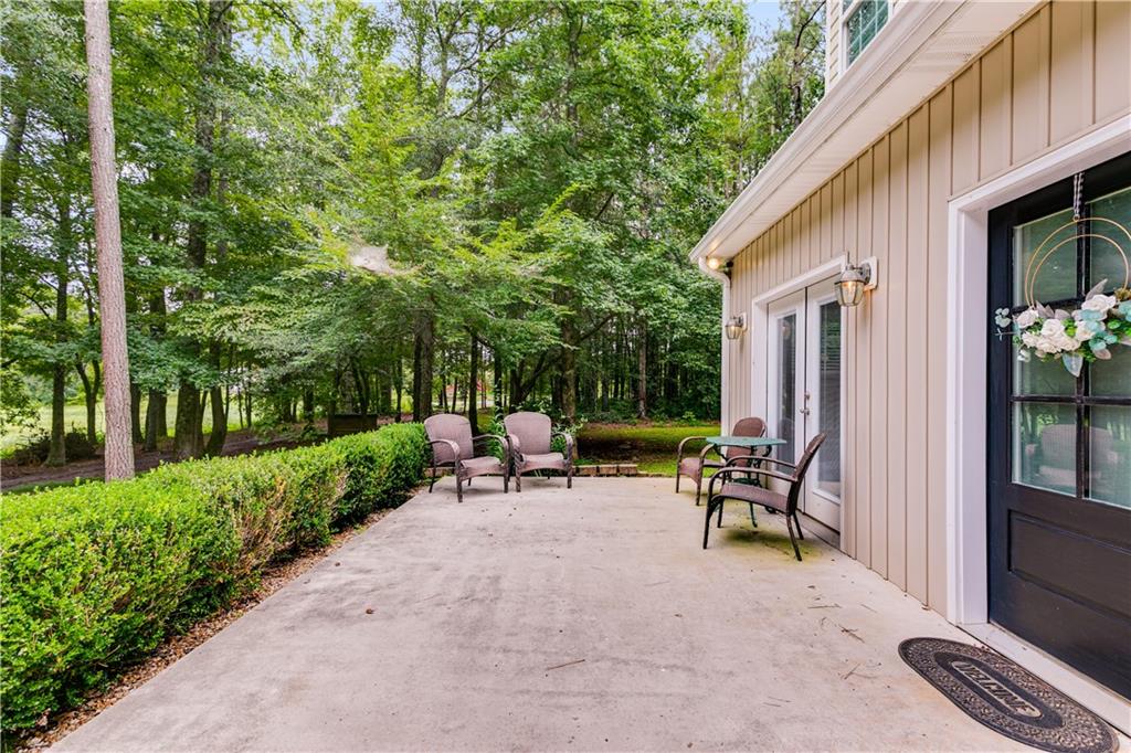 1800 Mandeville Road Bremen, GA 30110 - Photo 7 of 41 a view of a house with backyard and sitting area