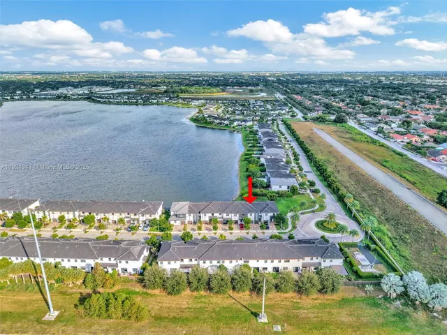 a view of a city with an ocean view