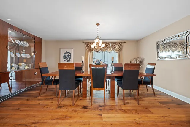 a spacious bedroom with a bed and a couch