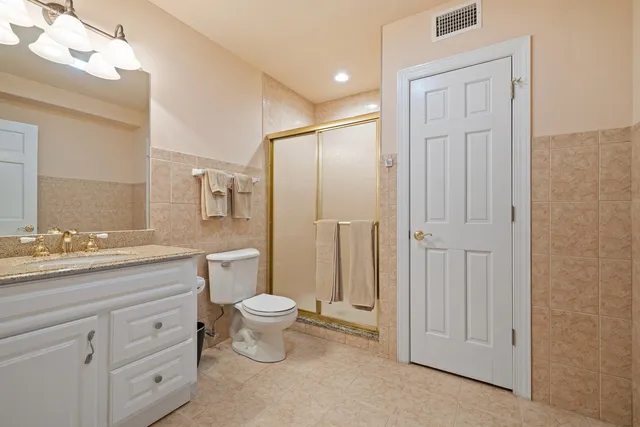 a view of a swimming pool with lounge chair