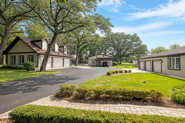 a view of house with outdoor space and street view