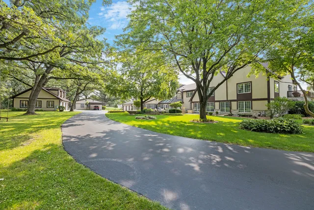 a view of a yard in front of a house