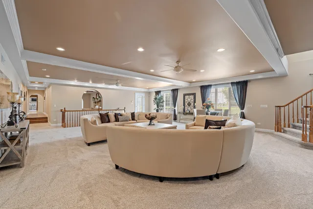 a living room with furniture and a table