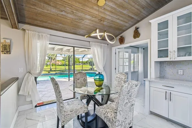 a living room with a sink and a window
