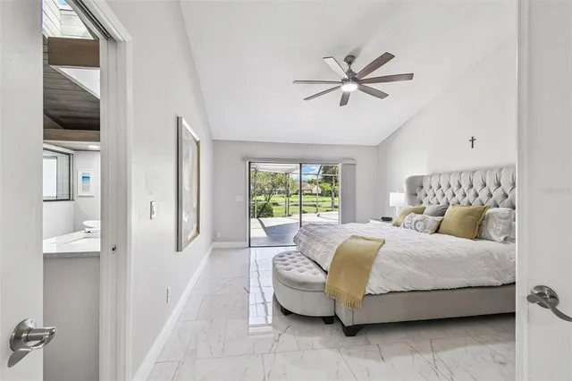 a bathroom with a shower and a bath tub