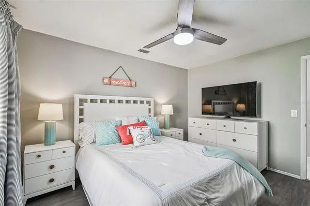 a view of a garden with a building in the background