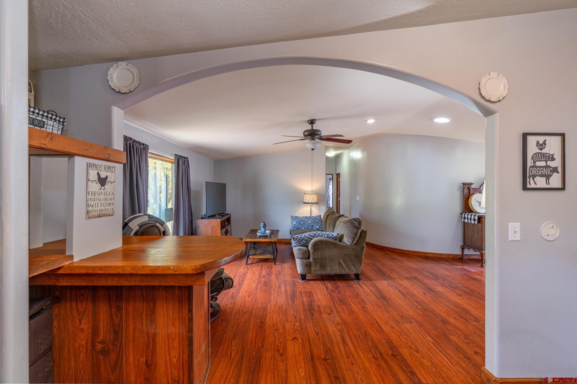 25109 Rd L.4 Cortez, CO 81321 - Photo 14 of 33 a living room with furniture and wooden floor