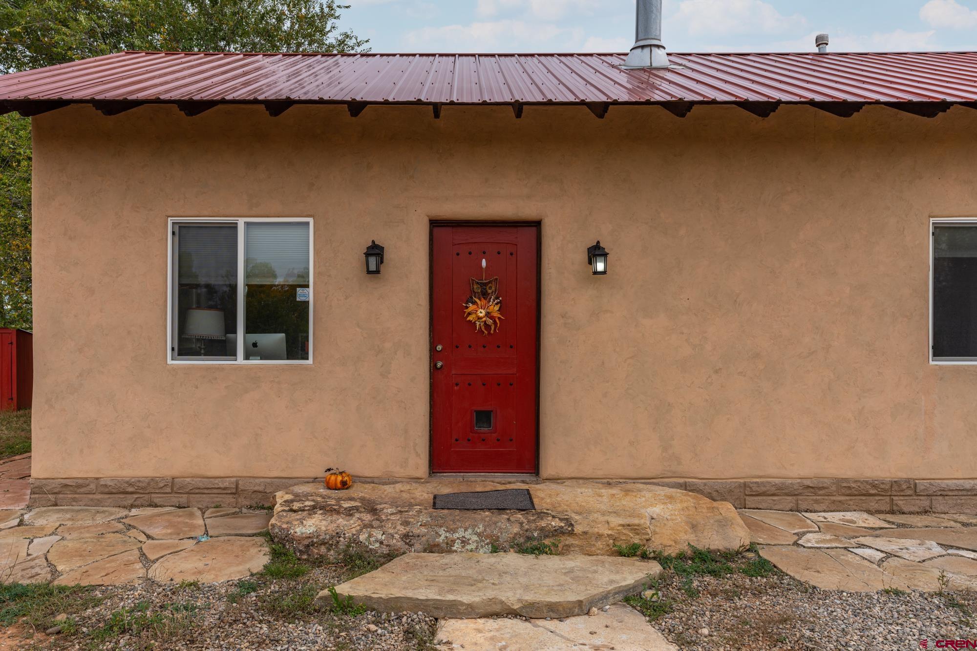 25109 Rd L.4 Cortez, CO 81321 - Photo 24 of 33 a front view of a house