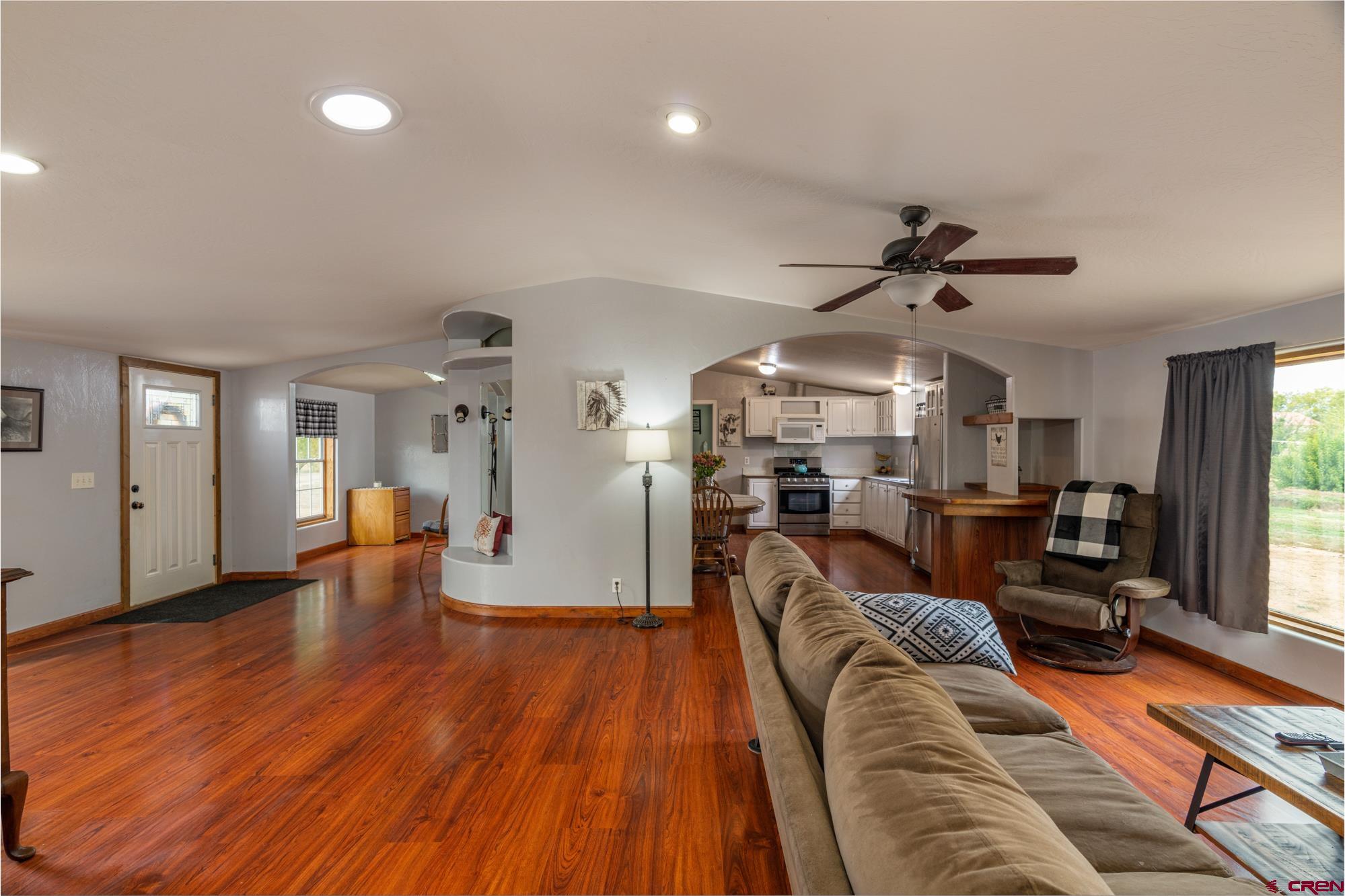 25109 Rd L.4 Cortez, CO 81321 - Photo 9 of 33 a living room with furniture and a wooden floor
